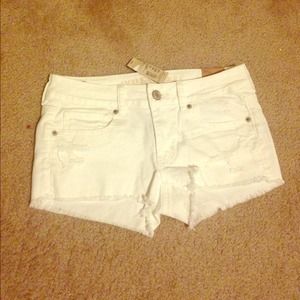 White frayed shorts