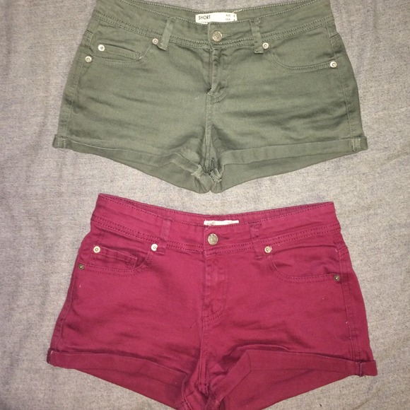 HOLD 2 pair of maroon and army green shorts