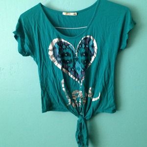 Teal crop top with love and a heart printed on it