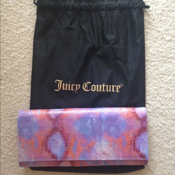 NWT juicy couture clutch with dust bag!