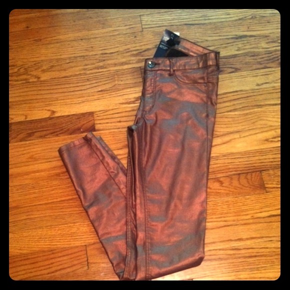 Brand new, metallic skinny jeans.