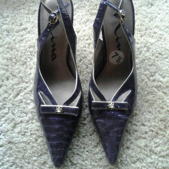 Purple pumps with fine gold trimmings.