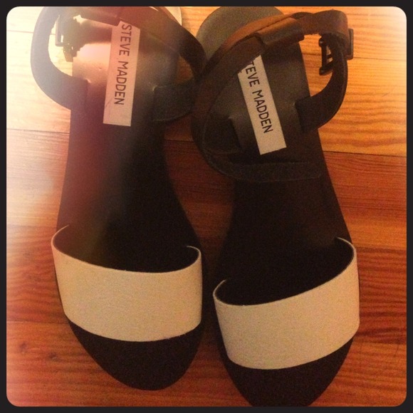 Black and white Steve Madden sandals