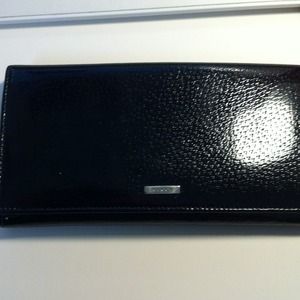 SOLD  Authentic Gucci black leather long wallet