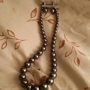 Set of earrings and necklace