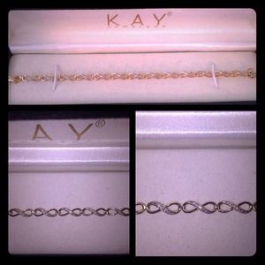 10k gold infinity bracelet.