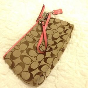 :: Coach :: Signature Wristlet with pink accent