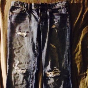 Distressed boyfriend jeans.