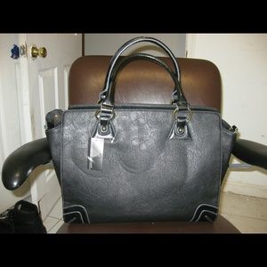 Black handbag manmade durable material for work