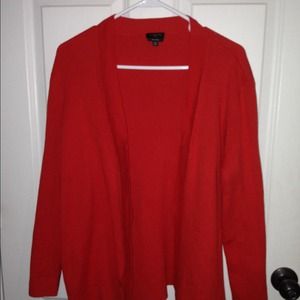 Pretty bright orange new cardigan. Never worn.