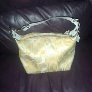 Authentic Small yellow coach handbag