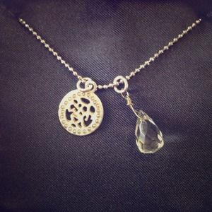 Asian lettering pendant with clear gemstone