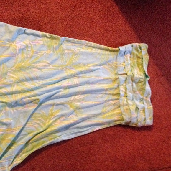 light blue with palm tree print on it