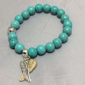 Turquoise with Silver and Gold Wings