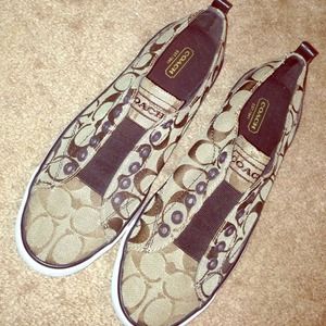Brand new brown and cream coach shoes.
