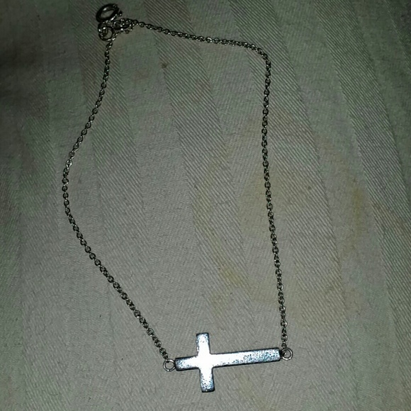 A beautiful sterling silver bracelets with a cross