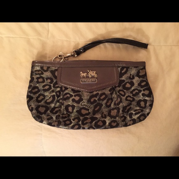 Coach Clutches & Wallets - [Coach] authentic cheetah wristlet. Ocelot print