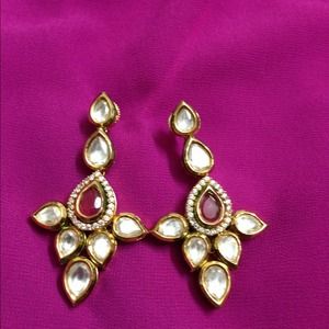 Bollywood earrings with kundan stones.