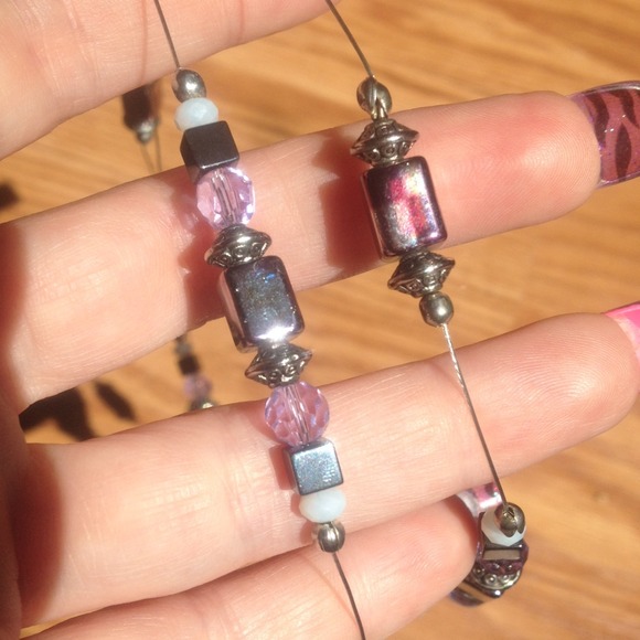 Long, "floating" necklace