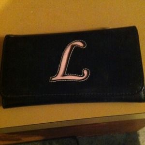 Black wallet very cute! Letter L for your name!:)