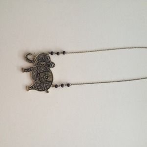 A cute antique bronze elephant necklace