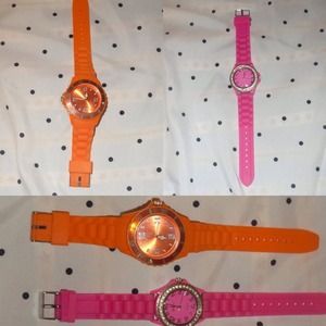 TWO PINK AND ORANGE WATCHES