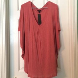 Orange/red top on the larger side