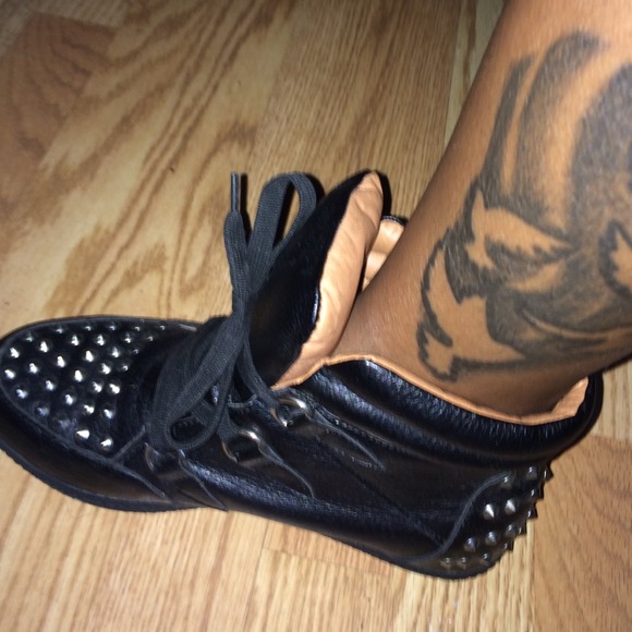 Black studded sneakers