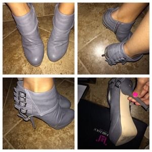 Grey booties. Super cute. Worn only 4 times