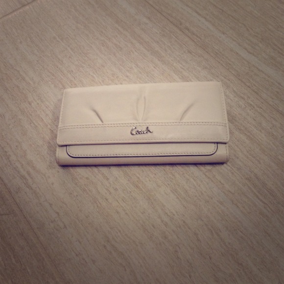 Coach white leather wallet.