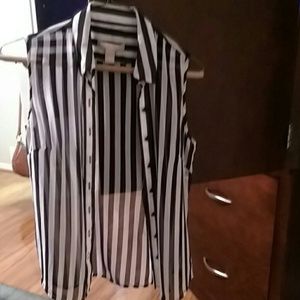 Sleeveless striped shirt. Never worn.