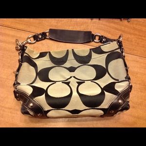 Medium sized Coach purse. Gray with black C's