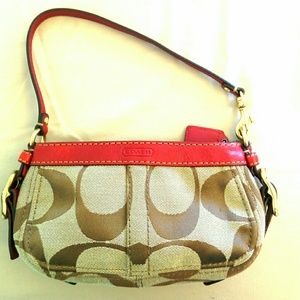 Mini Coach wristlet bag