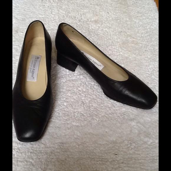 Black leather Etienne Aigner pumps. Gently worn.