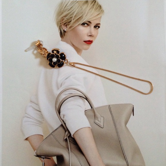 Chanel camellia flower cell phone headphone plug