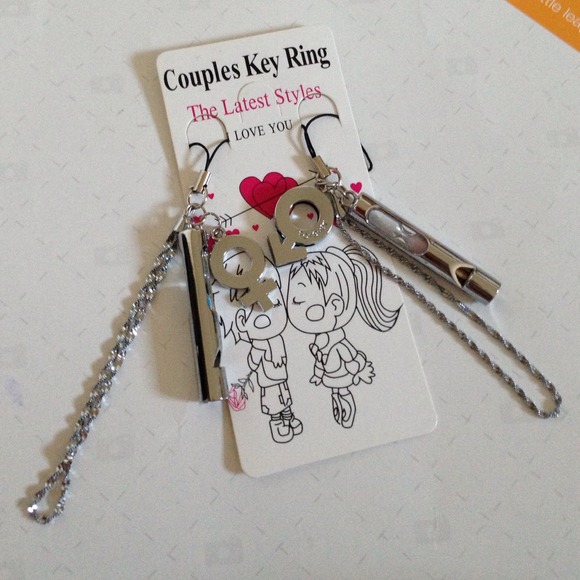 Couple interlocking male and female symbol charms