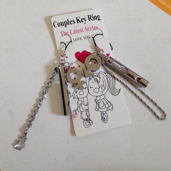 Couple interlocking male and female symbol charms