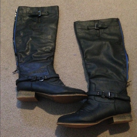Grey tall boots with blue zipper in back