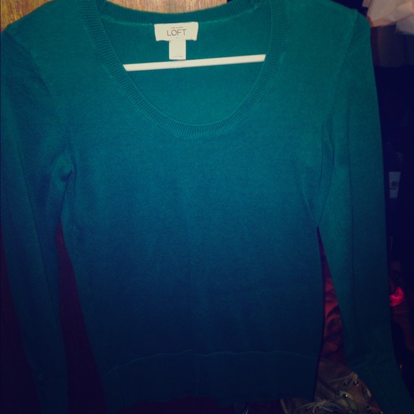 Jade green scoop neck sweater.