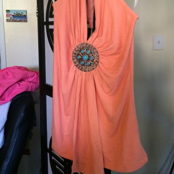Top with metal medallion detail with turquoise