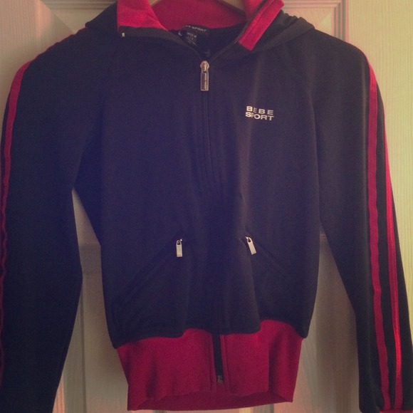 Sport jacket. Cozy on the inside. Pocket and hoody