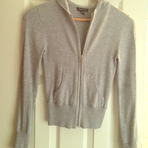 Very worn. Glittery, with hoody