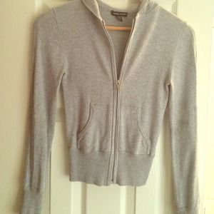 Very worn. Glittery, with hoody