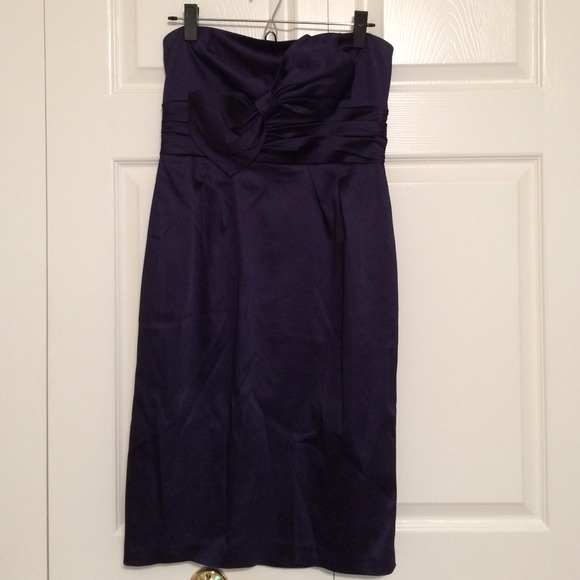 Purple, strapless dress with bow
