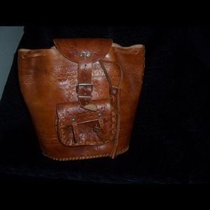 TOOLED LEATHER LARGE BACKPACK.