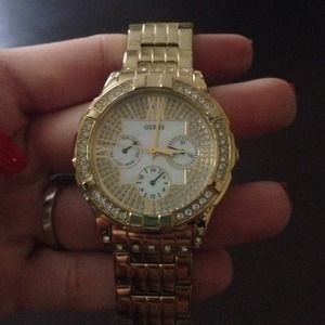 Guess gold watch with pearl dial