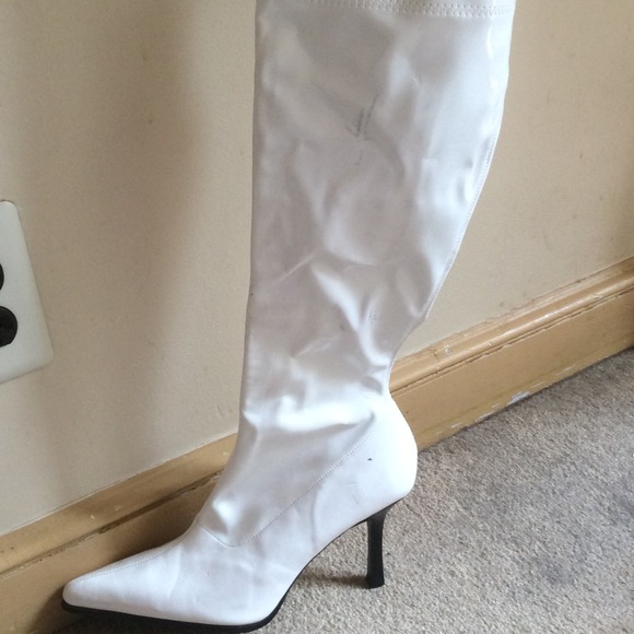 White boots. 2 1/2 in heel