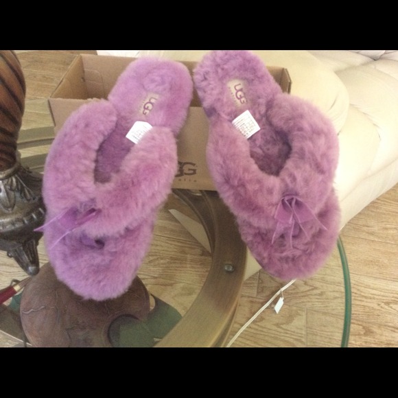 SOLD.  Uggs fur flip flops  new
