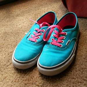 Aqua blue vans with neon pink shoelaces