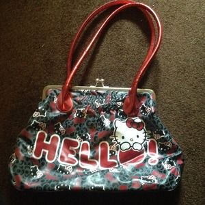 Hello kitty gently used hand bag grey black & red